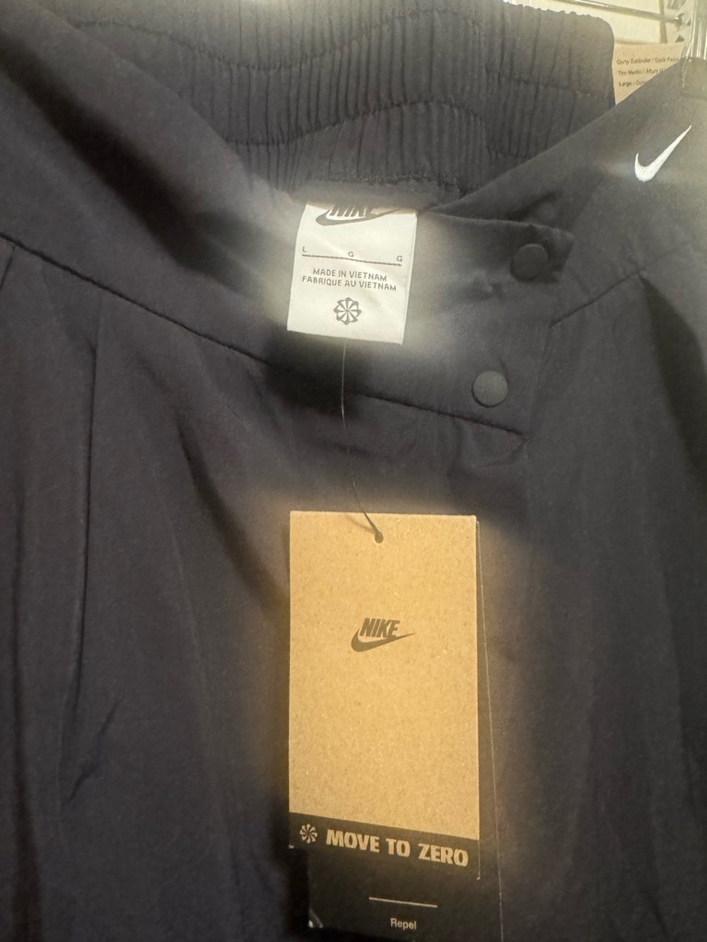 NIKE Asymmetric Waist Water Repellent Pants - Picture 9 of 16